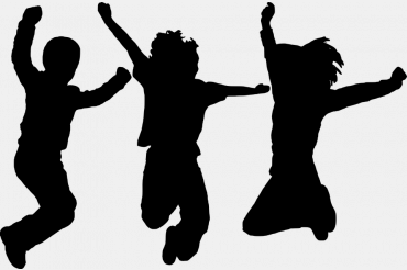 Silhouette of three kids jumping 