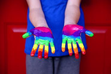 Rainbow painted on hands