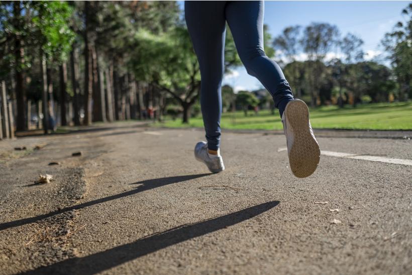 Picture of a person's legs running in park